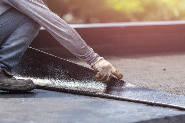 Professional Basement Waterproofing technician working in Alpine, AL